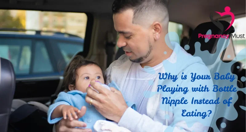 Baby Playing with Bottle Nipple Instead of Eating