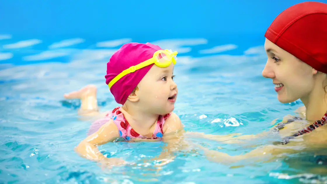 Baby Swim Lessons: Building Confidence and Water Safety Baby Swimming Lessons