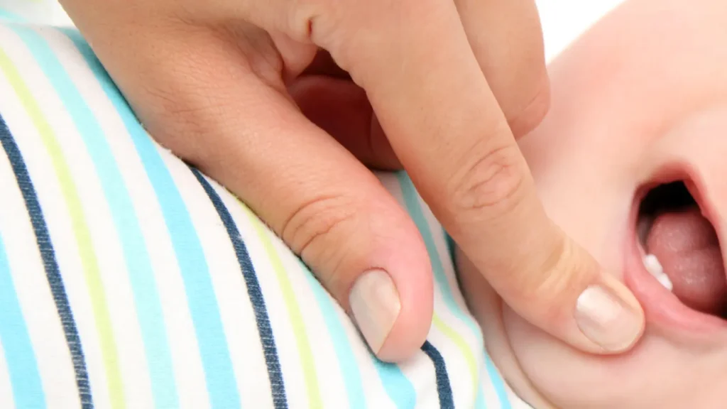 What are the signs that a baby is starting to teethe?